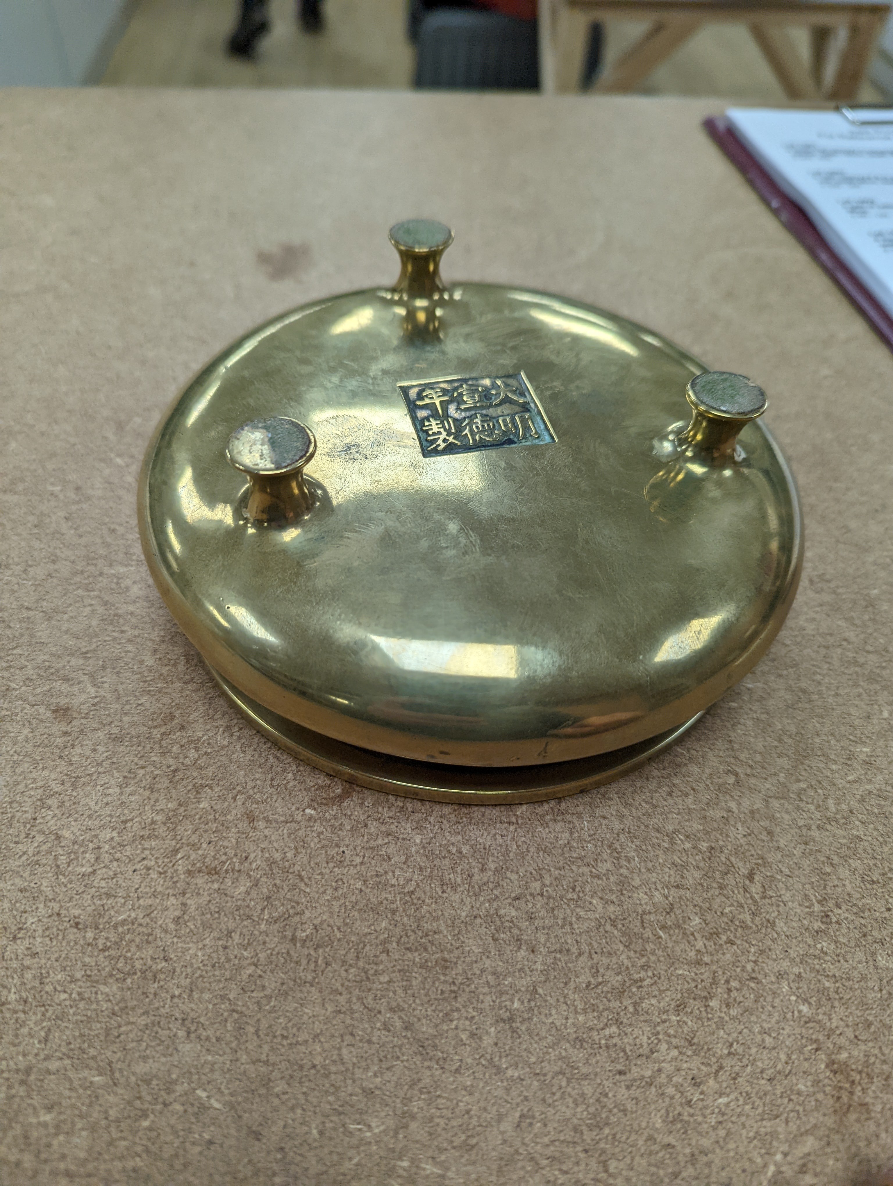 A Chinese bronze censer, ding, Xuande mark, 18th / 19th century, diameter 16.6cm, height 6.7cm